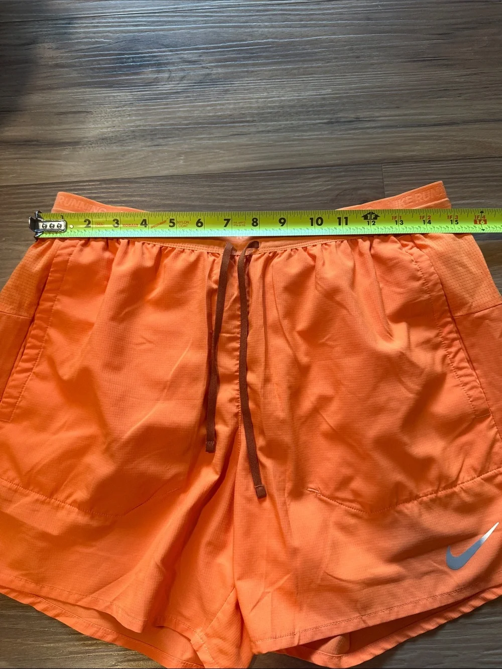 Nike Orange Athletic Running Shorts with Reflective Swoosh